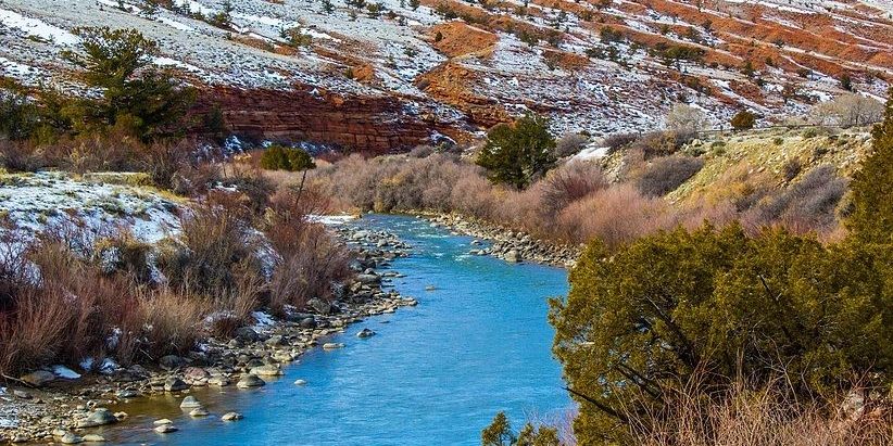 RV campsite in Wyoming with mountains and open landscape during summer