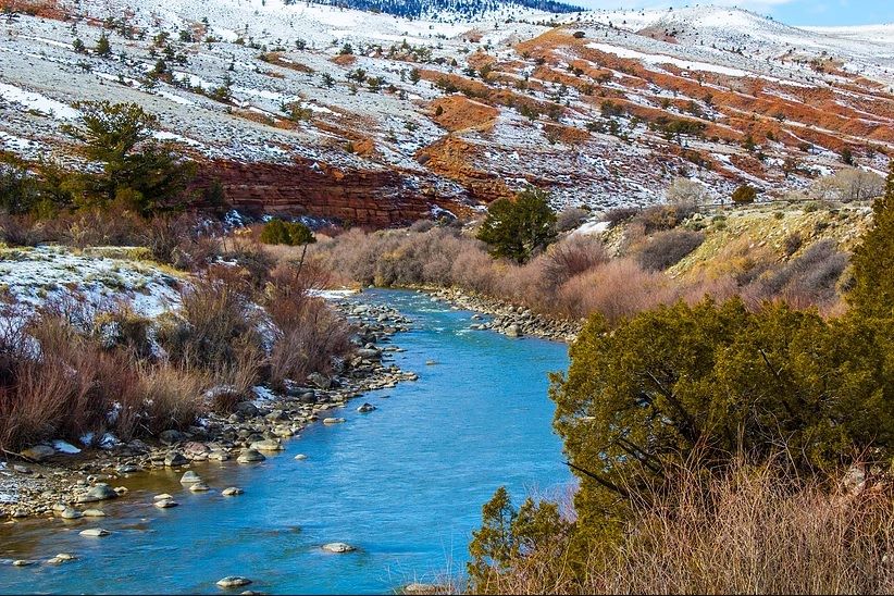 RV campsite in Wyoming with mountains and open landscape during summer