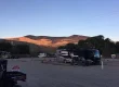Class A motorcoach at a Windhaven RV Resort campsite