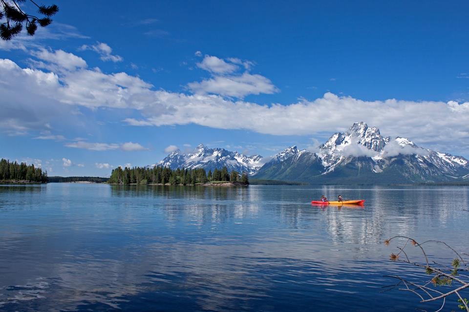 Kayaking and Paddleboarding in Grand Teton: Sort the Permits Before the Launch 1 Two kayakers paddling on Jackson Lake below the Teton Range
